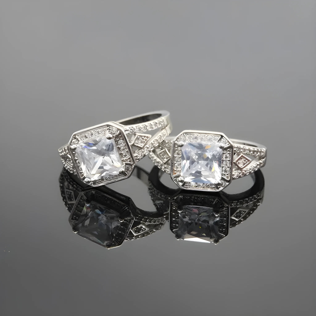 Geometric hollow design zircon ring in platinum-colour finish on copper, showing quadrilateral stone faceting