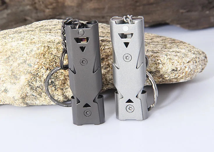 Metal keychain whistle with keychain ring in black and silver colour options