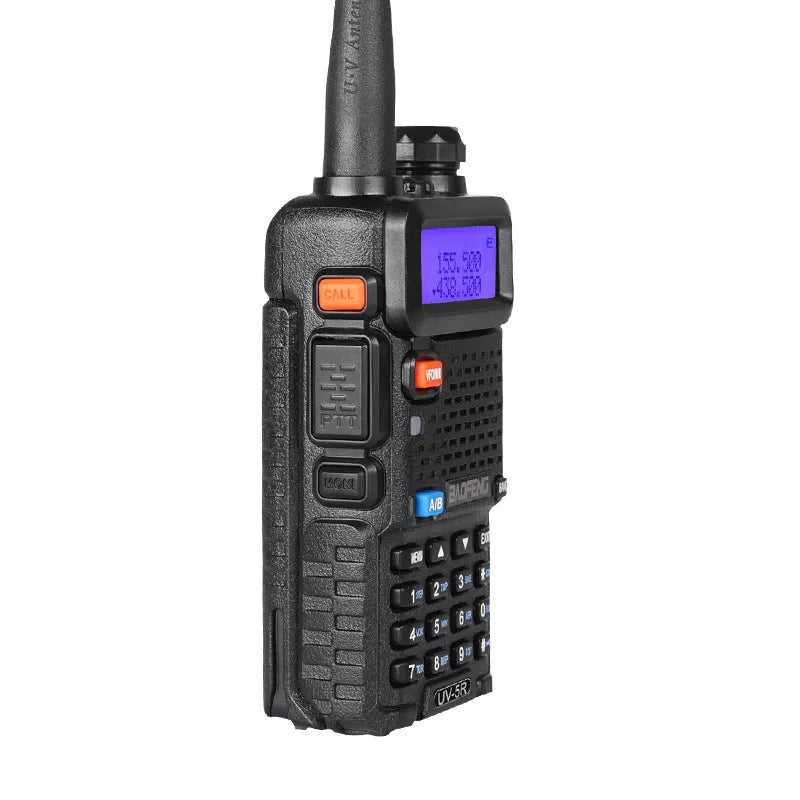Professional handheld VHF UHF two-way radio walkie talkie with extended antenna.
