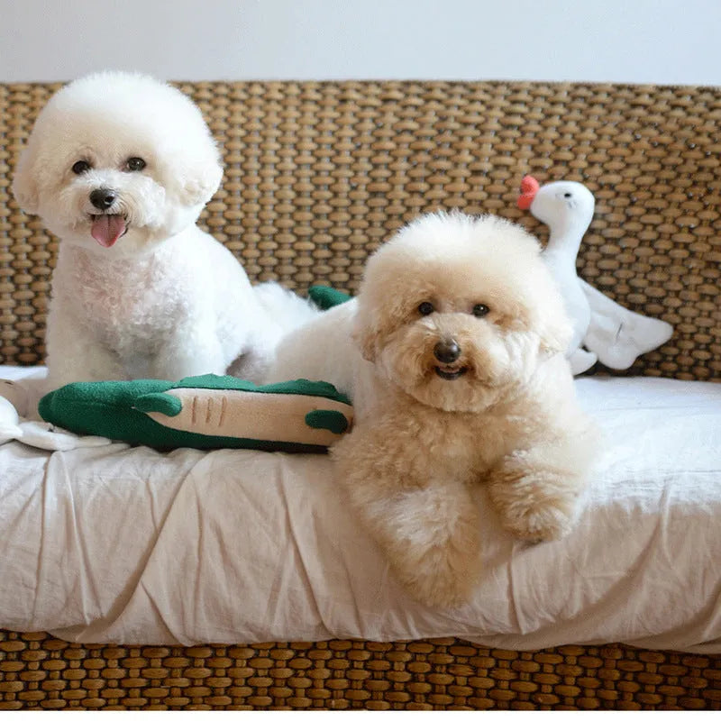 Green plush toy dog on a white background showing its 35x18cm size