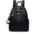 Medium-sized wine red Oxford cloth rucksack with double shoulder straps and a front digging bag.