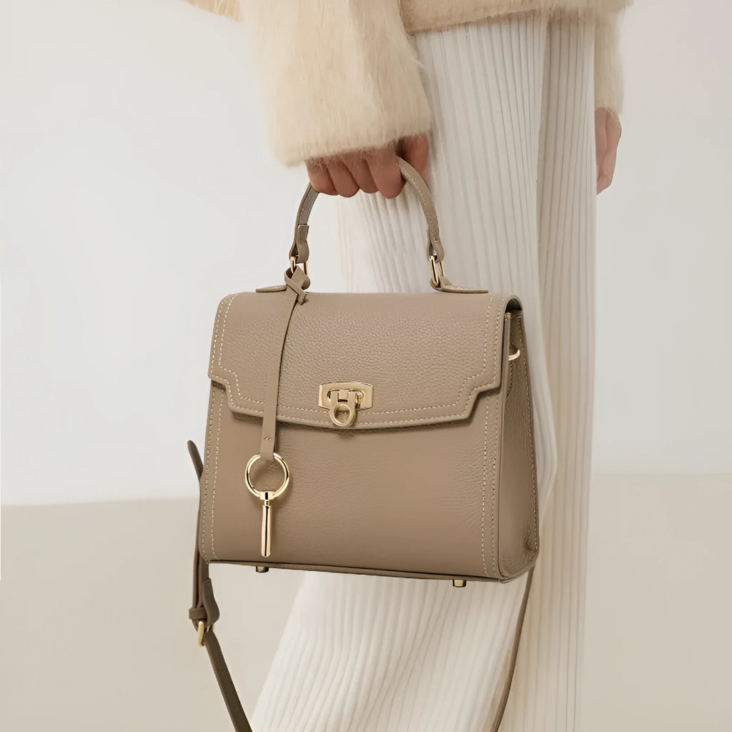 Elephant grey square genuine leather handbag with a vintage lock and textured litchi pattern.
