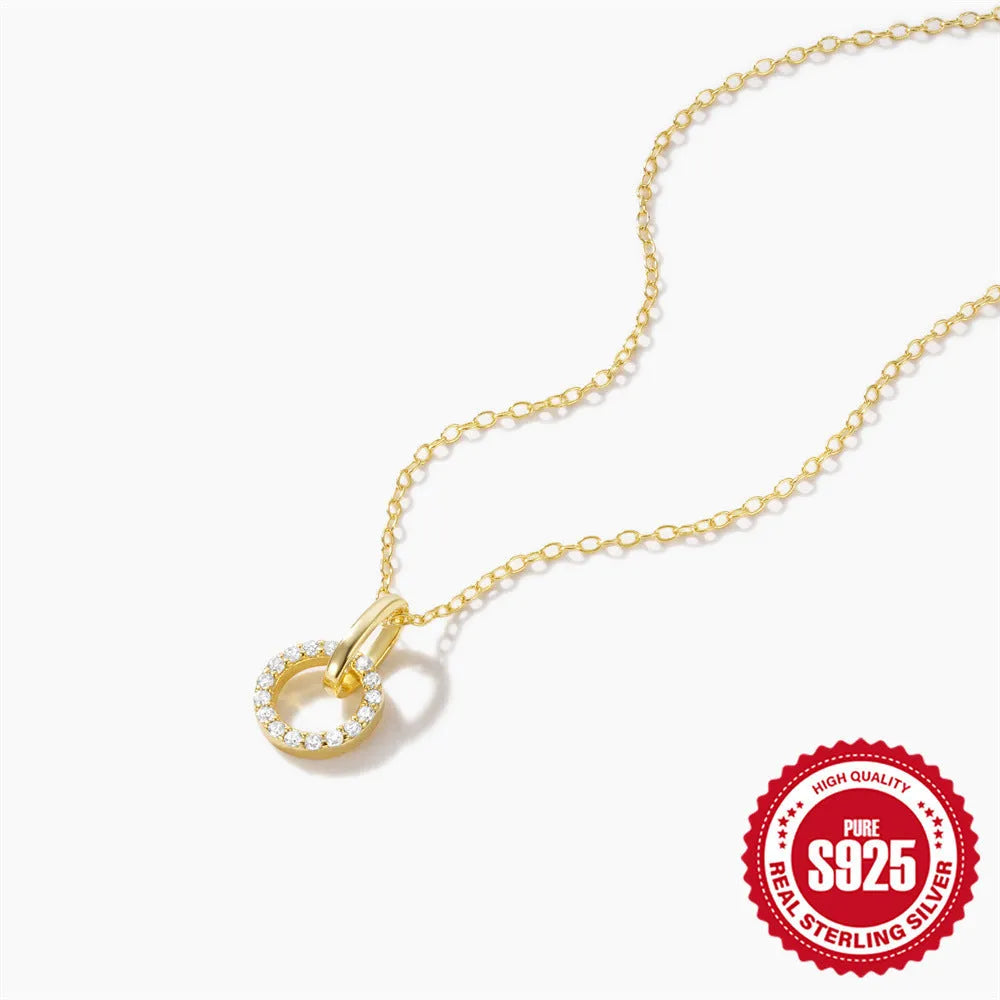 Gold colour S925 sterling silver necklace with geometric interlocking pendant containing micro inlaid zircon stones