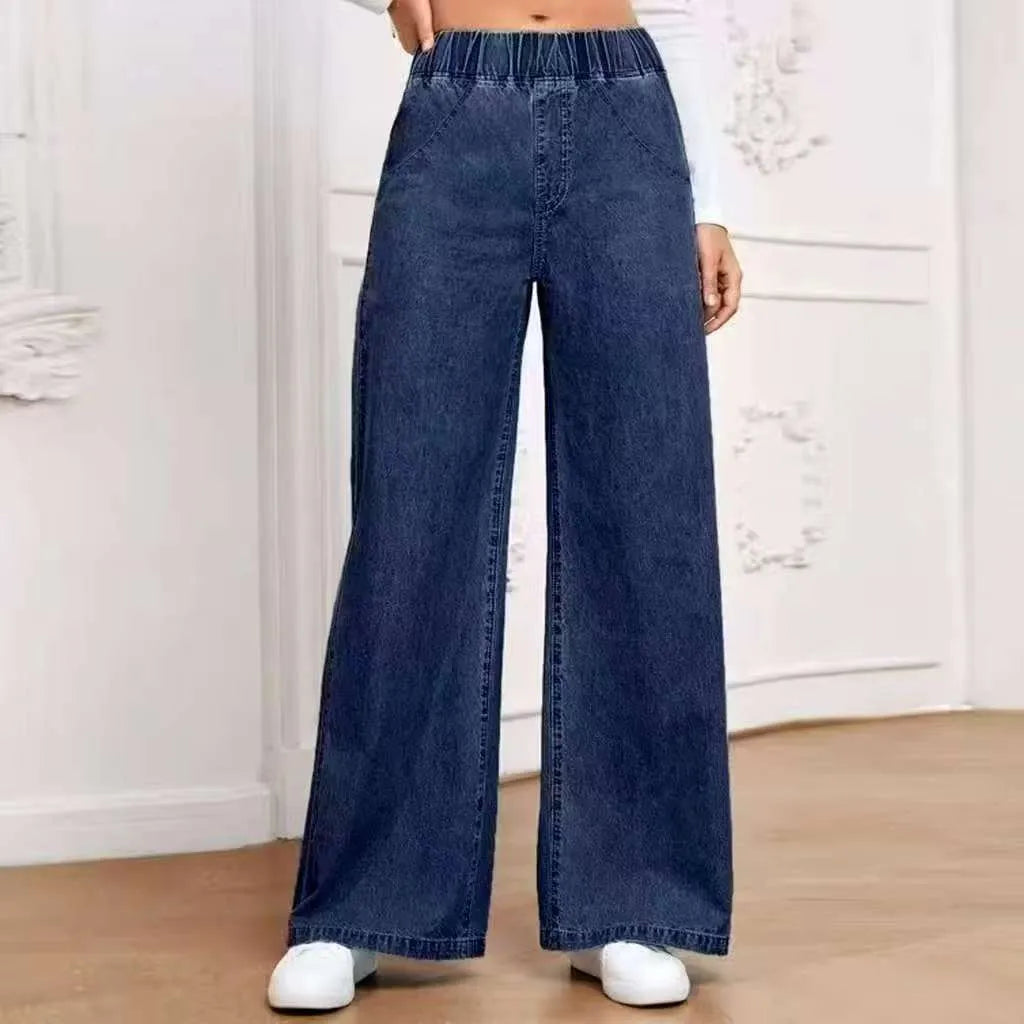 Light blue washed plus size wide-leg jeans with straight cut and mid waist design