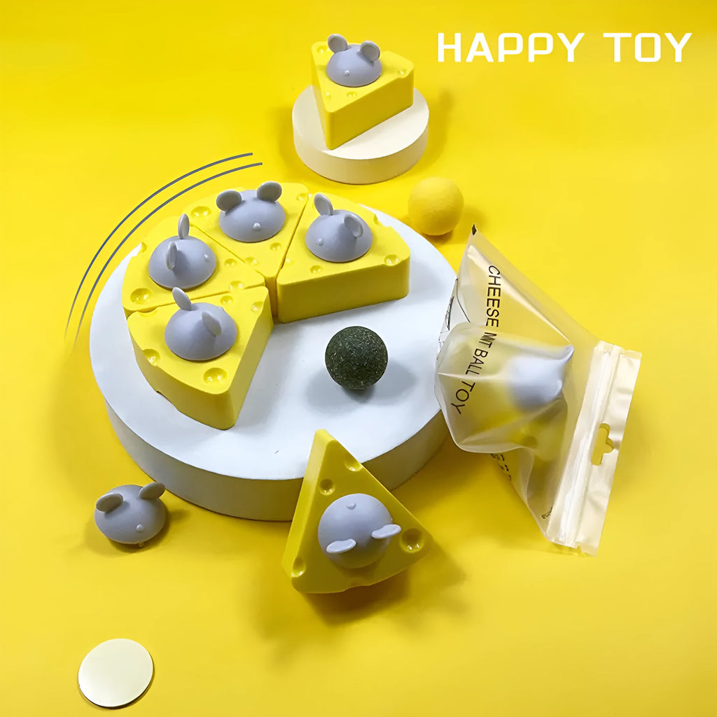 Yellow catnip and silvervine chew toy ball for cats on a plain background.