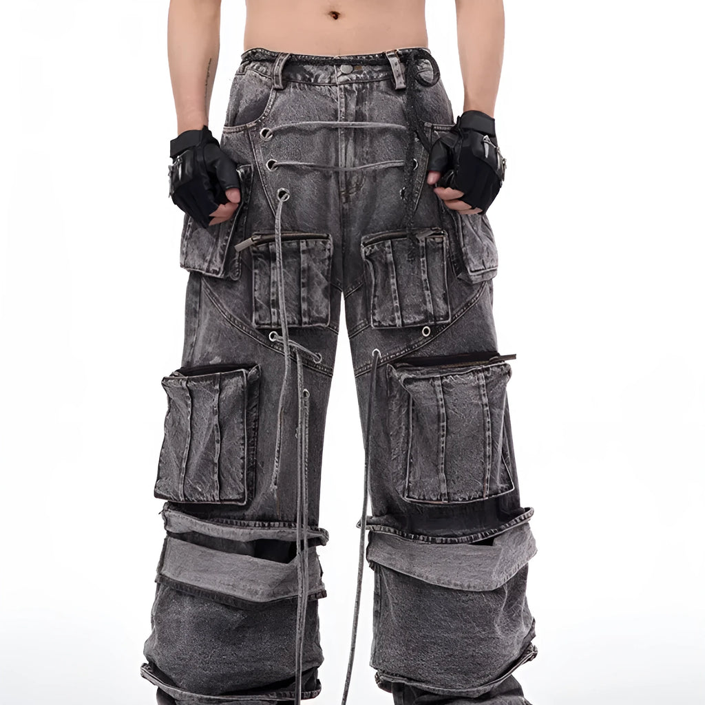 Grey cotton denim overalls with distressed finish and rope stitching on the legs.