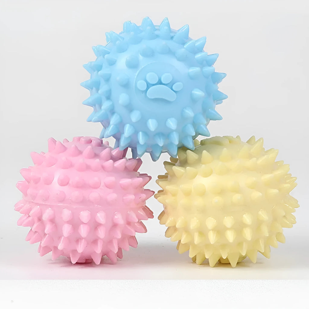Blue TPR dog chewing ball with footprint design and bulging sides for tooth cleaning.
