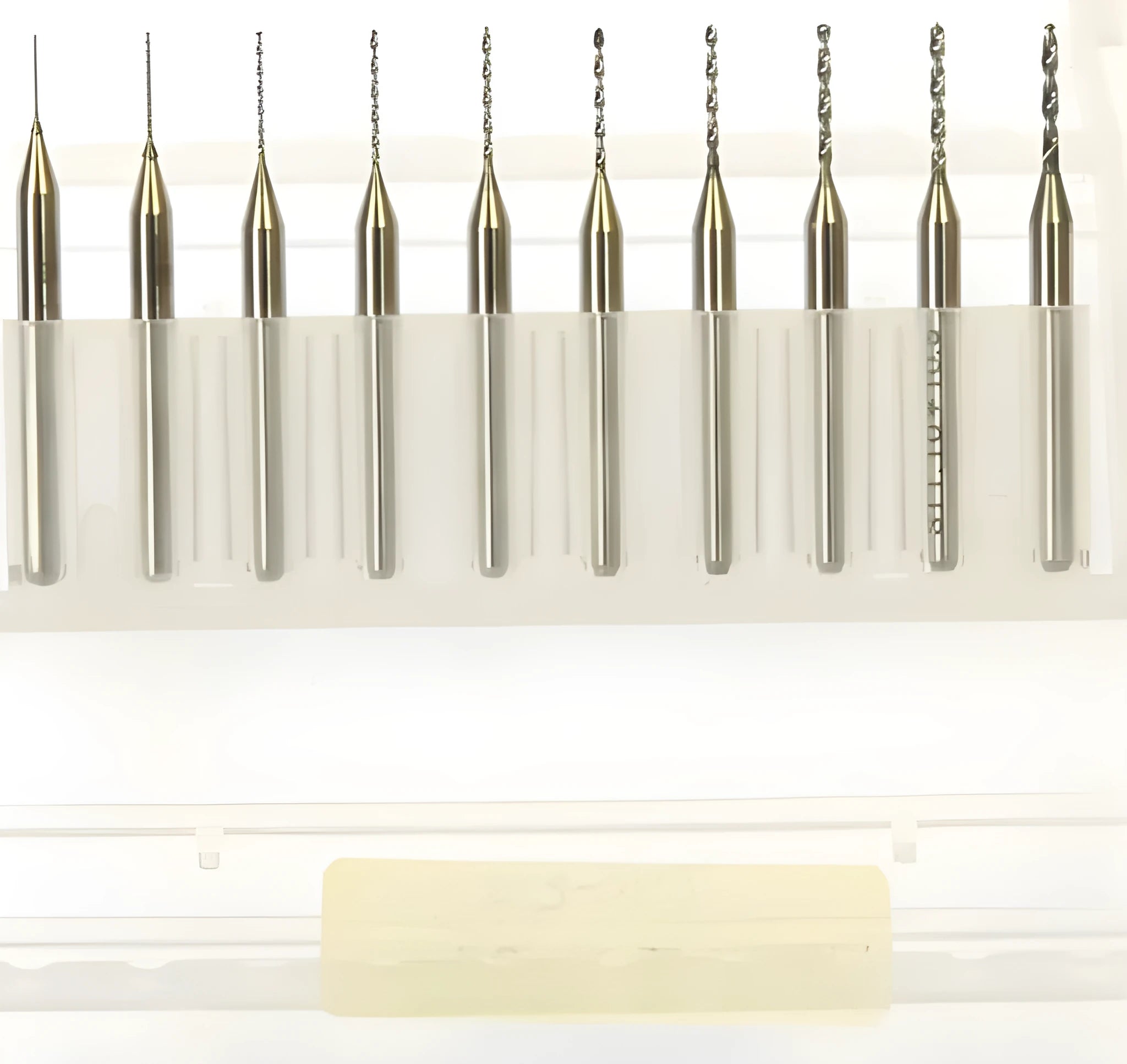 Close-up of imported tungsten carbide micro engraving bits for alloy, showing fine tips and size gradations.