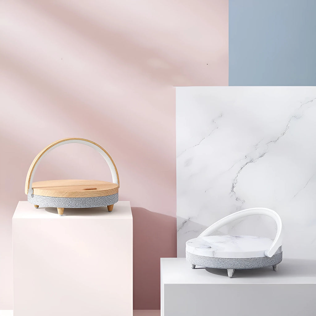 Wireless charging LED night light with Bluetooth speaker showing marble pattern finish and phone holder