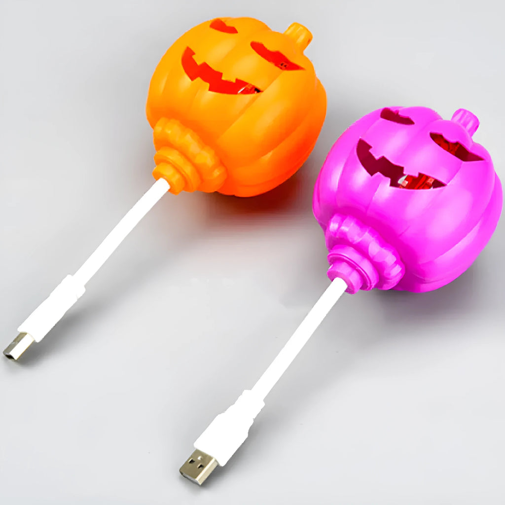USB-powered plastic pumpkin decorative lamp showing yellow or purple light option