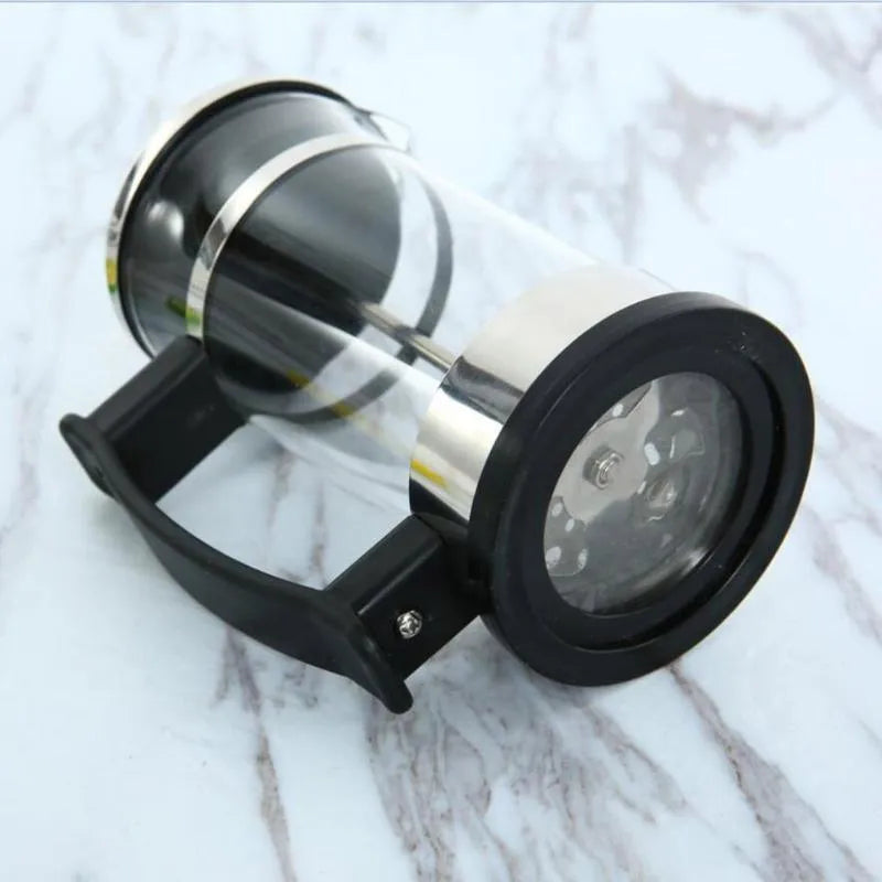 Compact glass and stainless steel manual pour-over coffee maker with 350ml capacity.