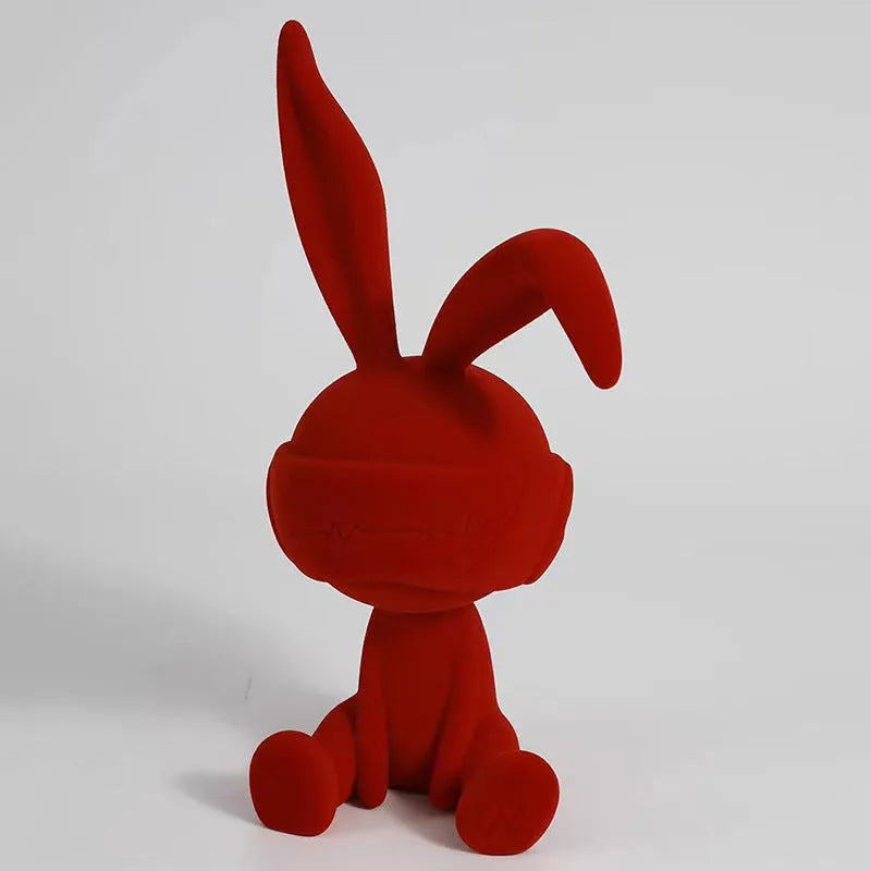 Resin rabbit table ornament with suede blindfold in blue, green or red colour options