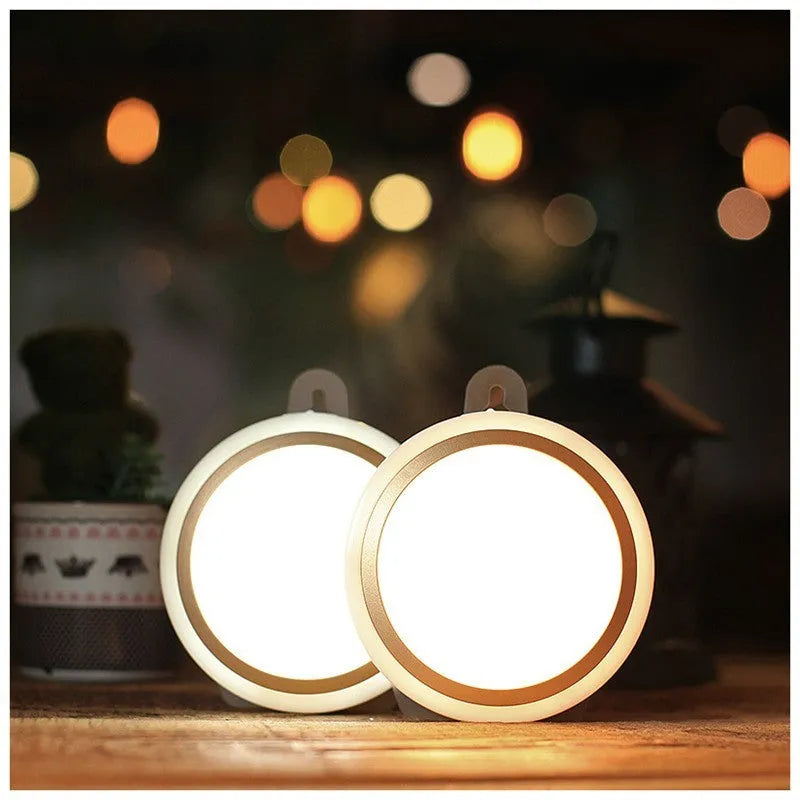 Circular white motion sensor LED light unit with a diameter of 80mm.