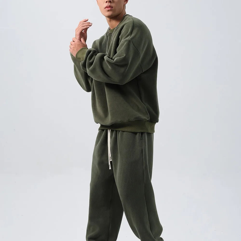 Men's polar fleece sports suit set showing jacket and trousers in winter colours