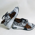 Women's casual suede sneakers with wedge heel in leopard print and black colour options