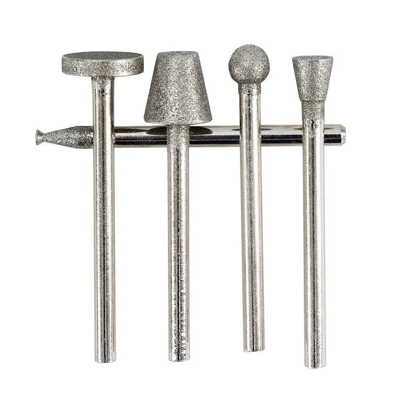 Set of two alloy grinding heads with emery coating and 3mm shanks for rotary tools.