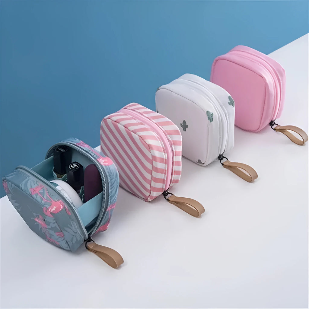 Blue cloth cube makeup storage bag with plain pattern, open to show space inside