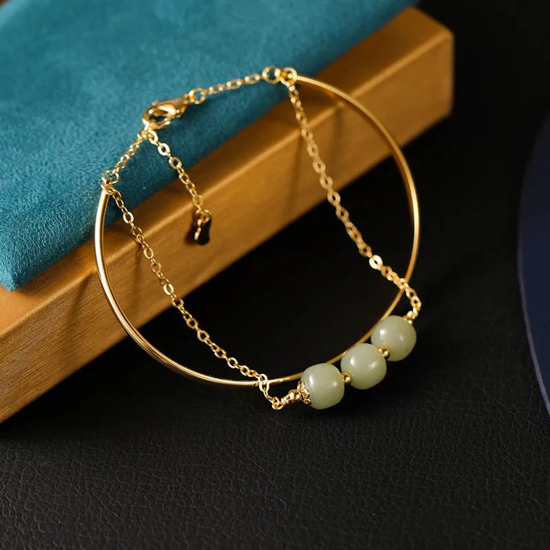 Women's Hetian jade lucky beads bracelet with gold inlay detailing in single, double and three bead versions