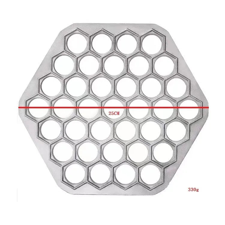 Creative dumpling mold with 37 holes made from aluminium alloy on a kitchen counter