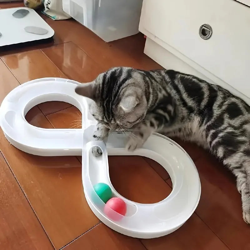 Blue and white interactive cat toy turntable with ball track and teasing stick on floor