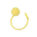 Green cat toy ball with attached rope on a wooden floor, shown next to a yellow 3cm size version.