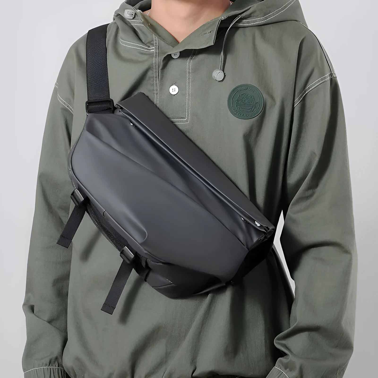 Grey men's medium horizontal PU crossbody sling bag with a single shoulder strap.