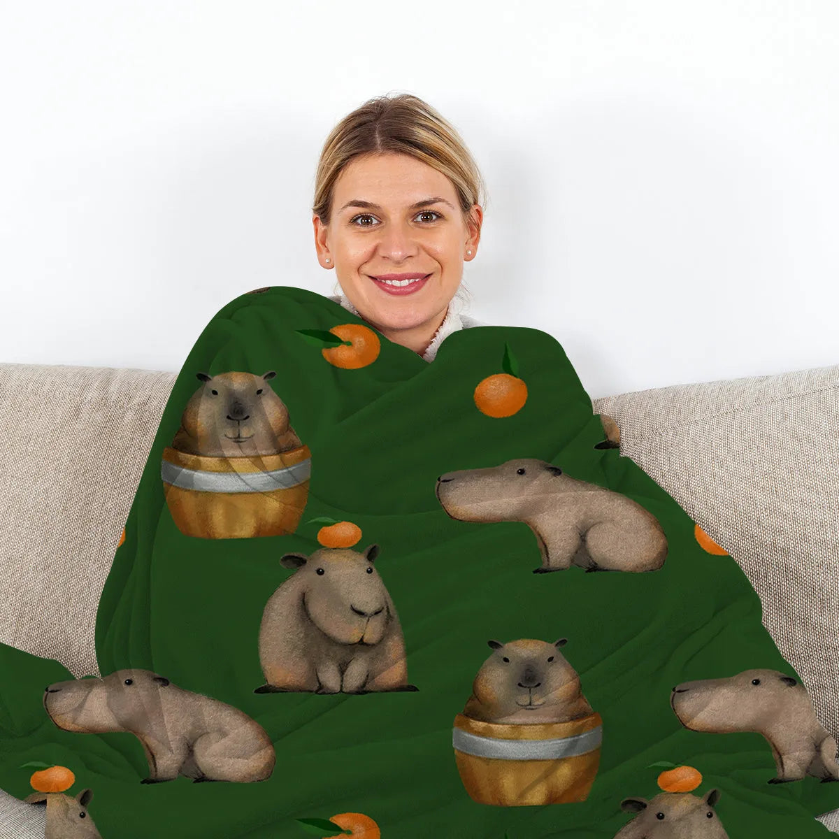 Flannel orange and capybara pattern soft fluffy multifunctional printed blanket on sofa