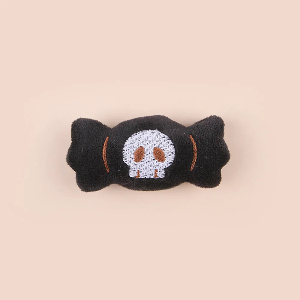 Small plush cat teaser toy with feather wand attachment in candy design
