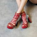 Black snake skin fish mouth high-top shoes with Roman block heels and thick rubber soles