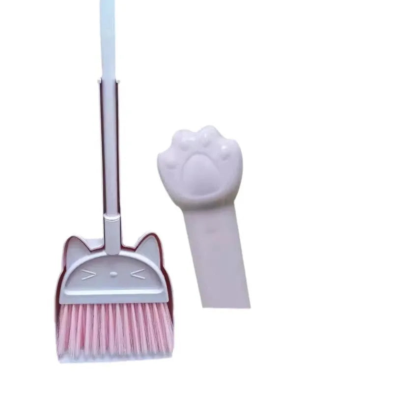 Purple broom and dustpan set with non-stick rotating brush head and integrated storage holder