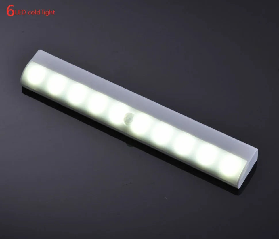 Silver aluminium USB rechargeable LED strip light with magnetic back for wardrobes.