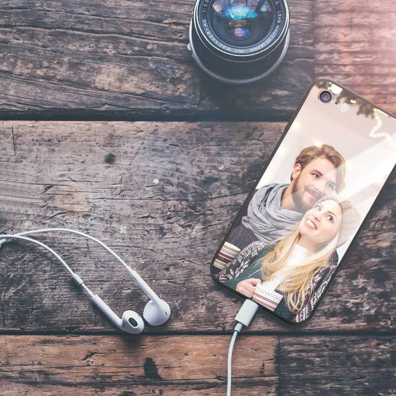 Slim hard back patterned case for iPhone with raised edge protecting camera and screen.