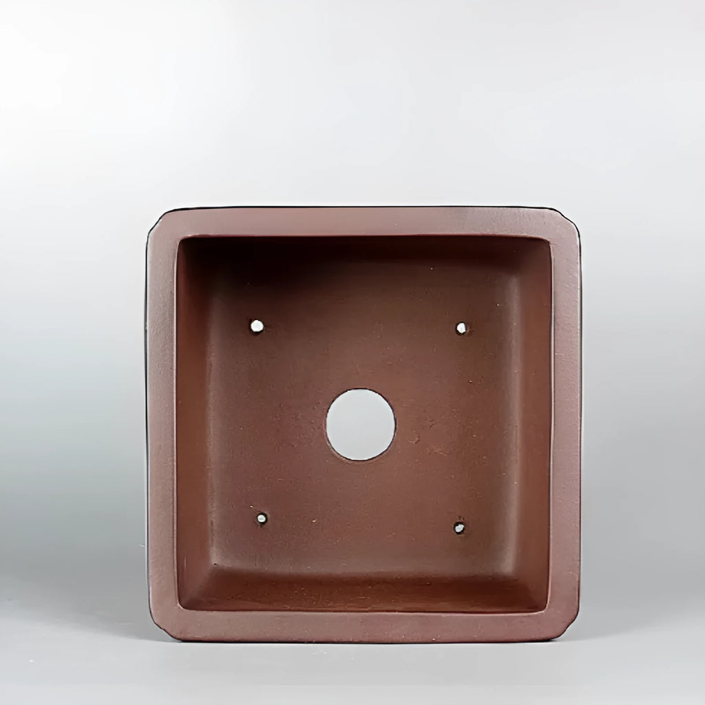 Brown handmade antique purple clay flower pot measuring 19x19x11.5 cm