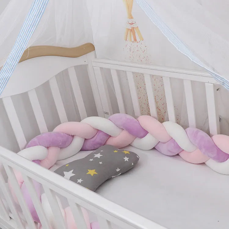 Braided knot baby crib bumper pillow in spandex velvet showing bendable design and colour options.