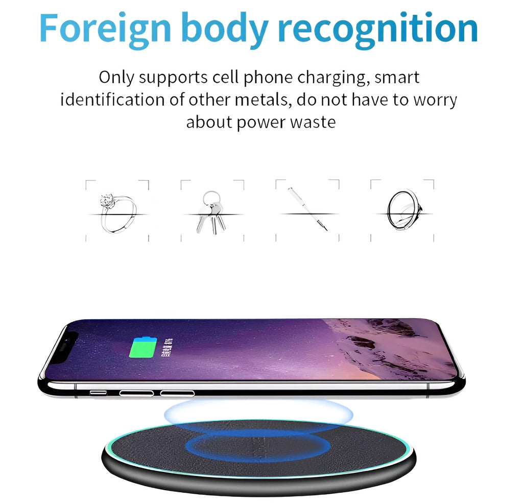 Black Qi wireless charging pad for iPhone 11 on a wooden surface.