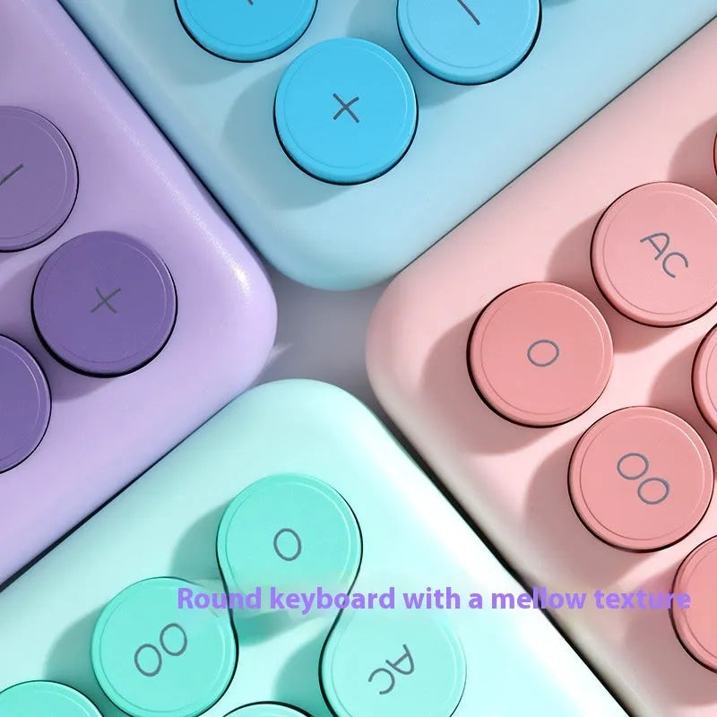 Gradient colour desktop calculator showing four colour options: cherry blossom pink, glacier blue, mint green and violet