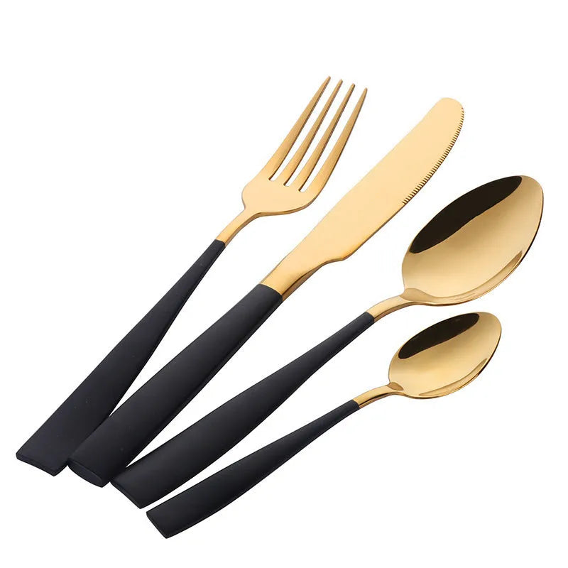 Four-piece stainless steel cutlery set in black with mirror polished finish