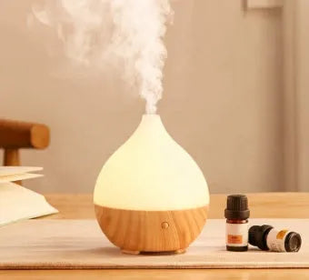 Asakusa wood grain finish vase-shaped USB aroma diffuser on a table.