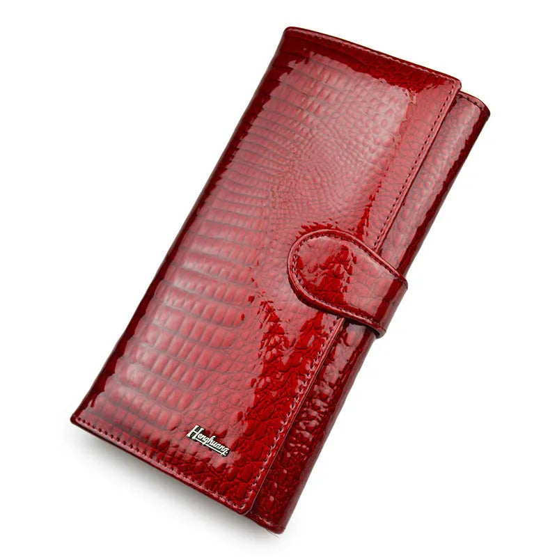Genuine leather women's coin purse with crocodile pattern patent finish in wine red colour