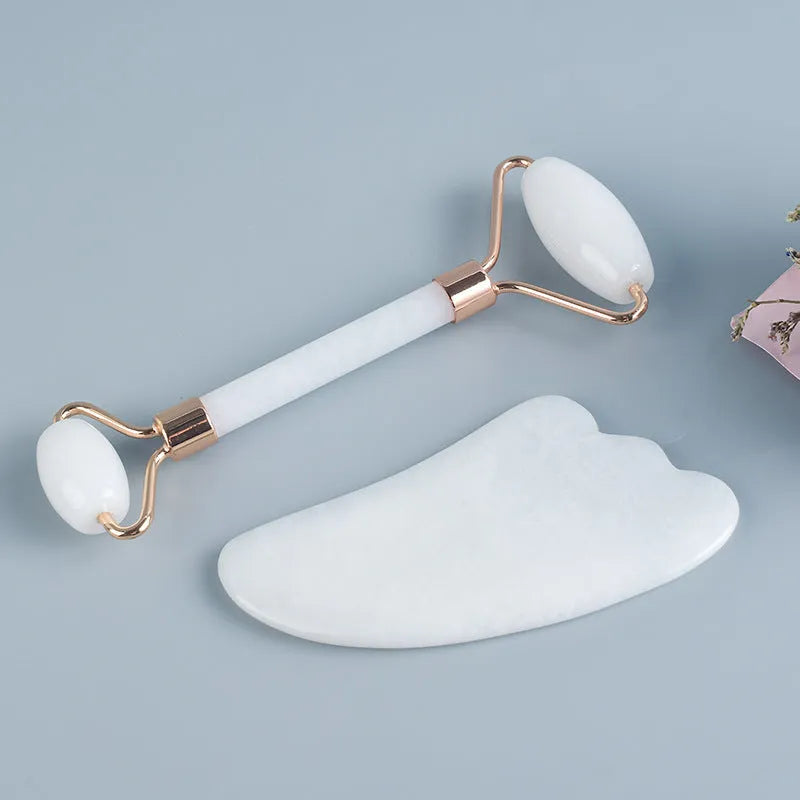 White jade roller and claw massage set with storage board for facial and body treatment