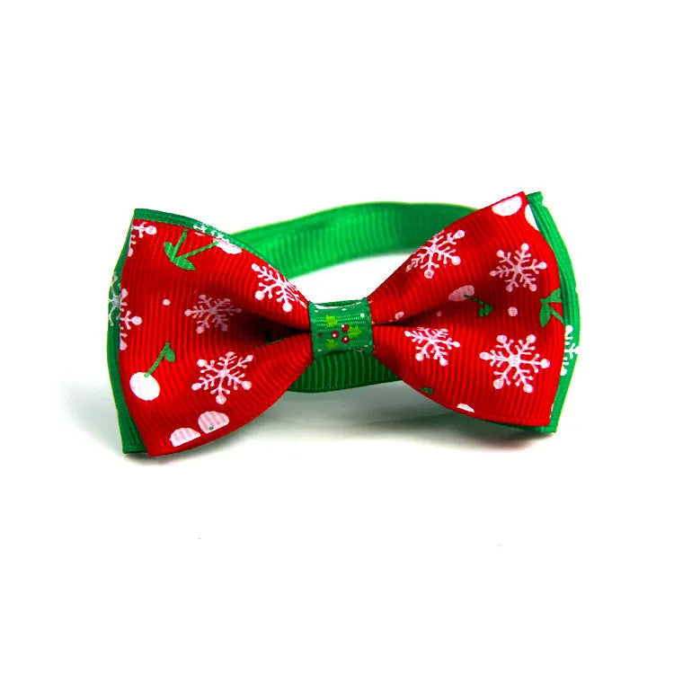 Handmade ribbon dog bow tie in nine colours with adjustable 20-26cm neck loop on a small dog