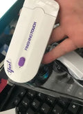 White cordless laser hair removal machine with purple sensa-light technology, trimmer and microfoil heads, 12cm length