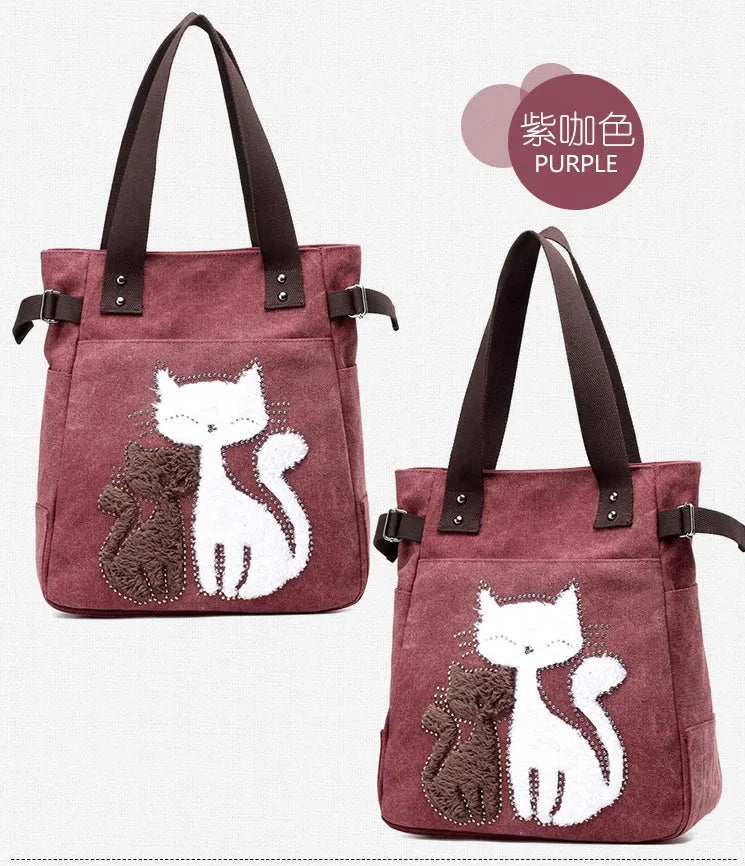KVKY canvas handbag with plush cat applique in beige colour on a woman's shoulder