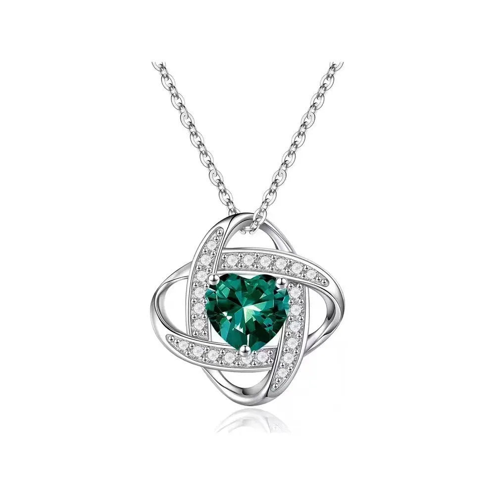 Copper heart-shaped pendant necklace with electroplated finish and coloured stones.