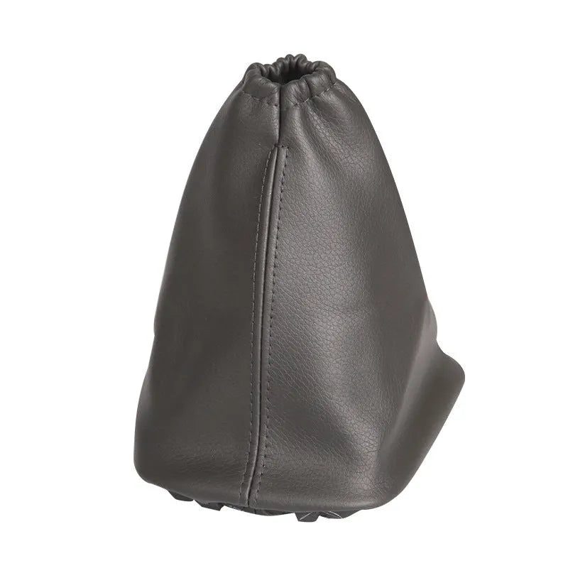 Black leather car shift lever dust cover for Toyota Corolla measuring 15.2 by 12.9 by 2.3 cm