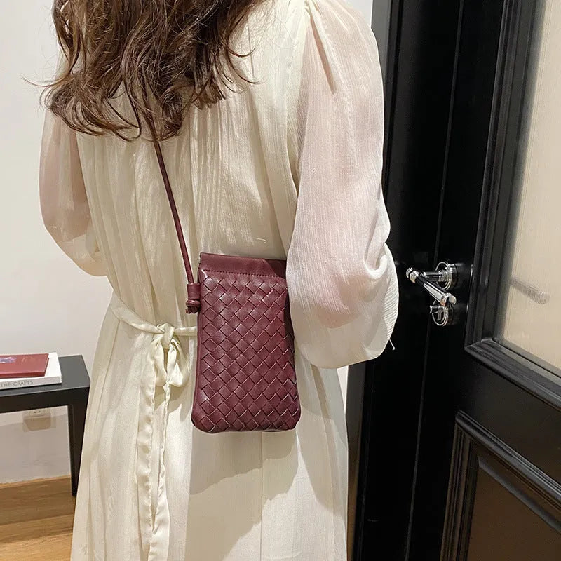 Vintage weave pattern PU leather crossbody phone bag in vertical square shape showing dark cell interior