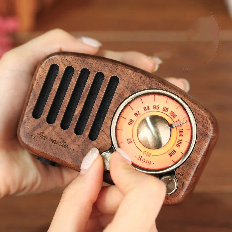 Retro wooden wireless mini speaker in cherry wood or walnut finish with 5W output and Bluetooth connectivity