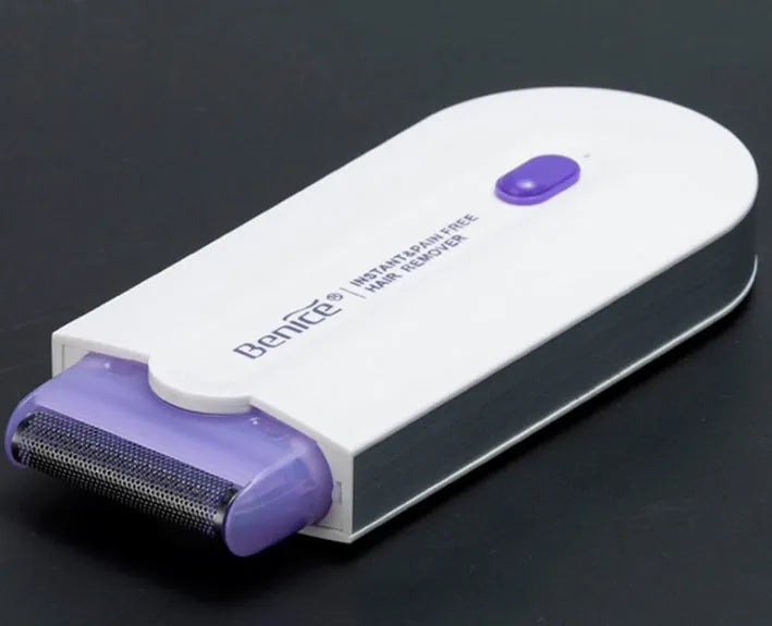White cordless laser hair removal machine with purple sensa-light technology, trimmer and microfoil heads, 12cm length