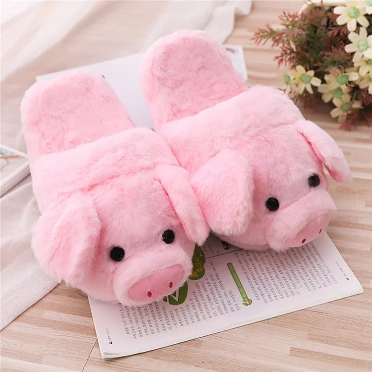 Pink pig floor slippers with short plush material showing size conversion chart for international measurements