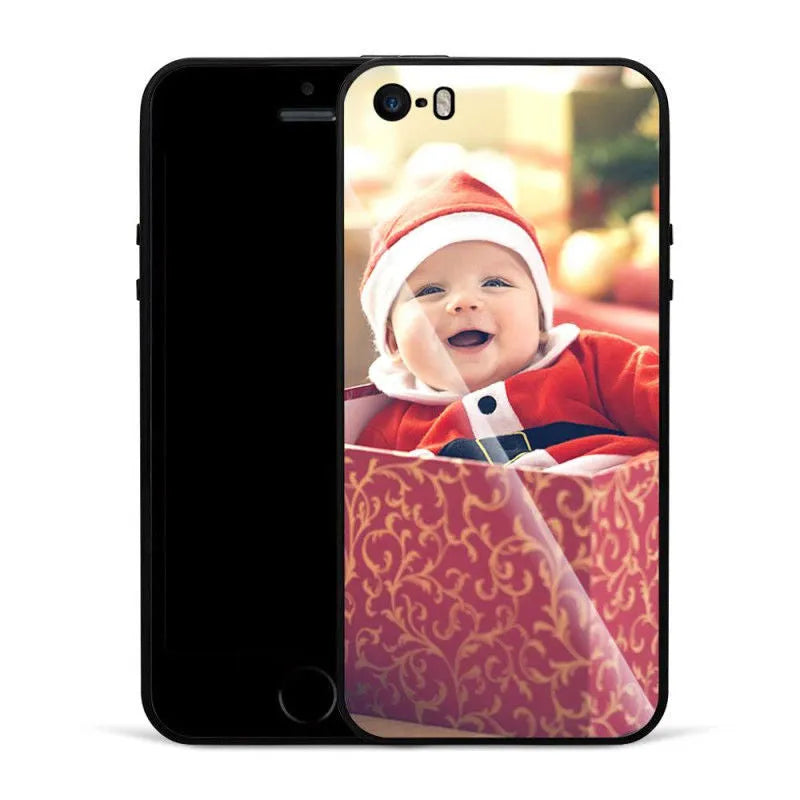 Slim hard back patterned case for iPhone with raised edge protecting camera and screen.